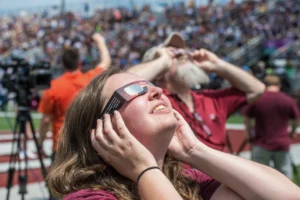 woman watching eclipse